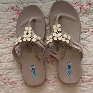 Beautiful OkaB Sandals with plumeria embellishment.